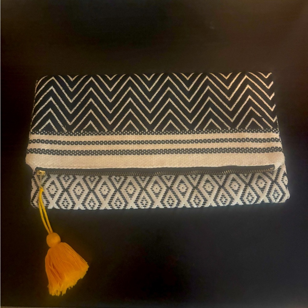 Tribe Alive + Canary Clutch